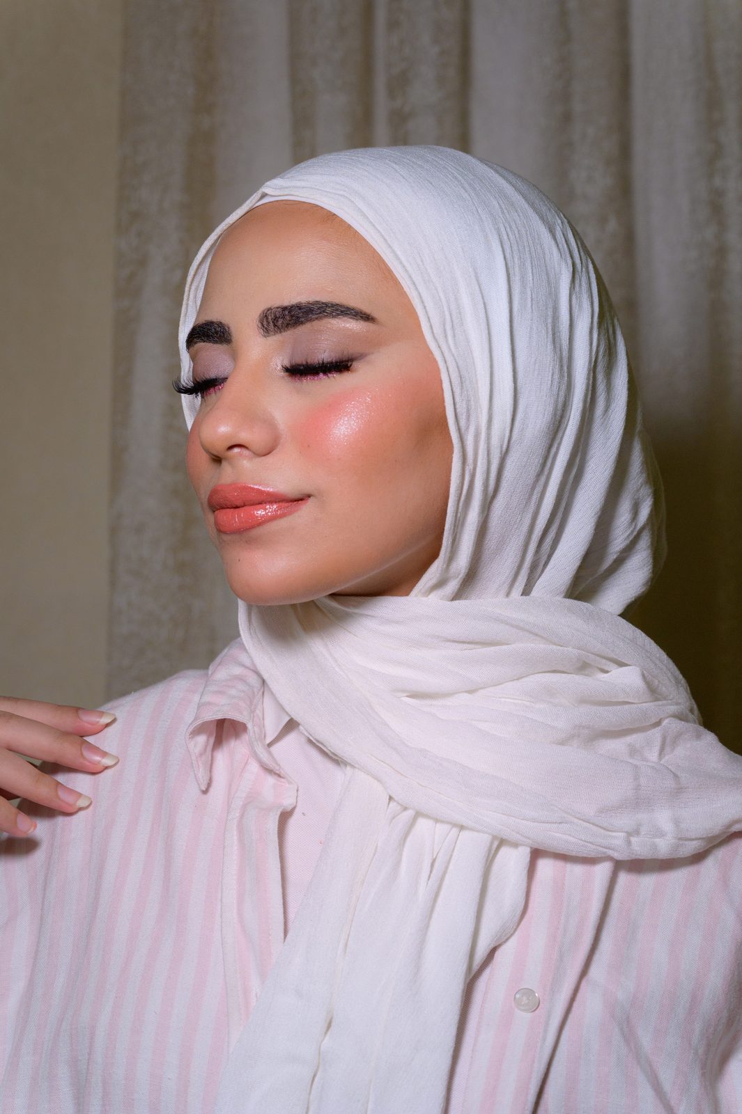 Elegant makeup look with defined eyes and glowing skin